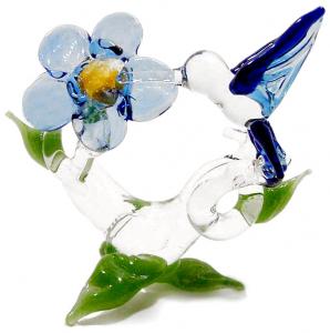 [Click for larger view] Blue hummingbird & flower